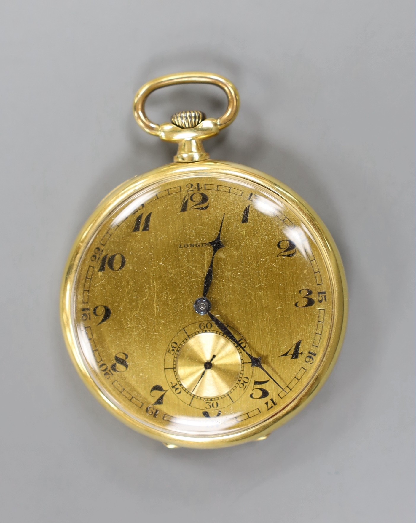 An 18k Longines open face keyless dress pocket watch, with Arabic dial and subsidiary seconds, case diameter 47mm, gross weight 56.5 grams.